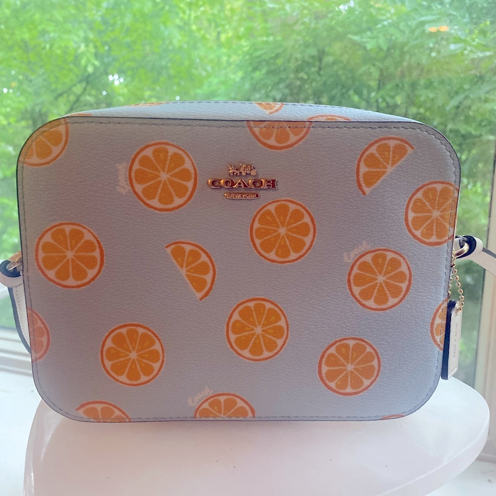 Authentic Coach camera bag with oranges